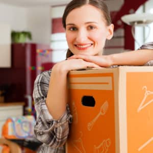 Image of a woman with a moving box